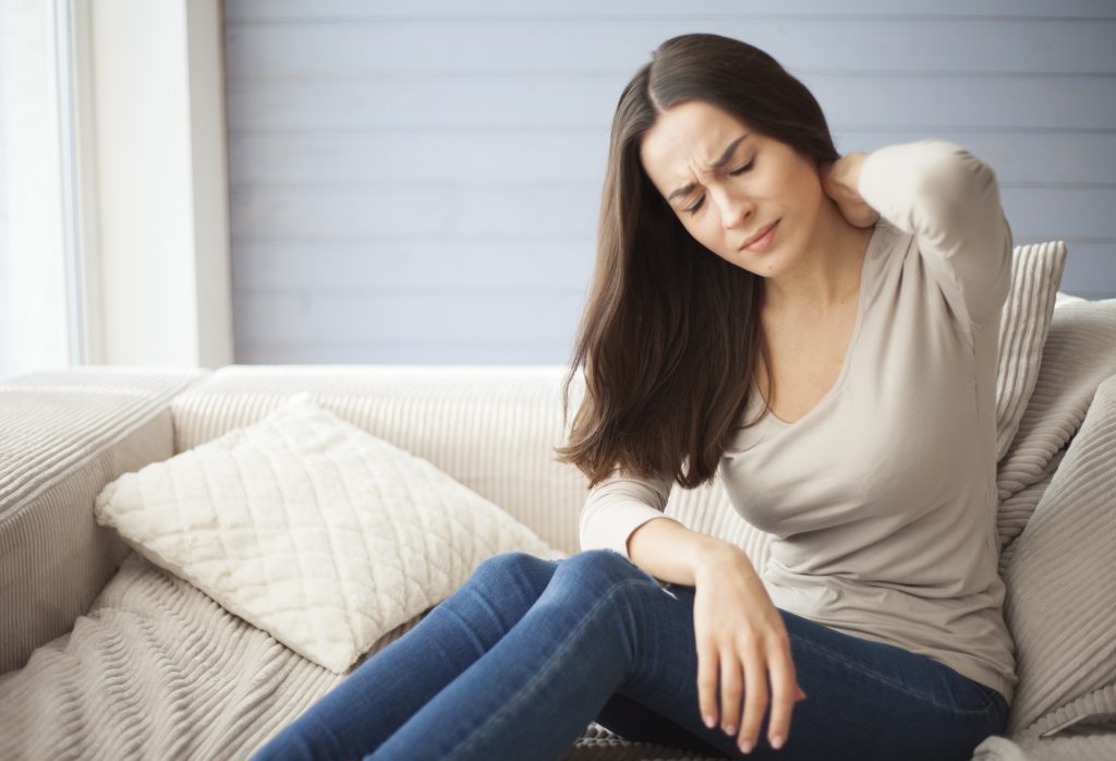 Woman with a sore neck